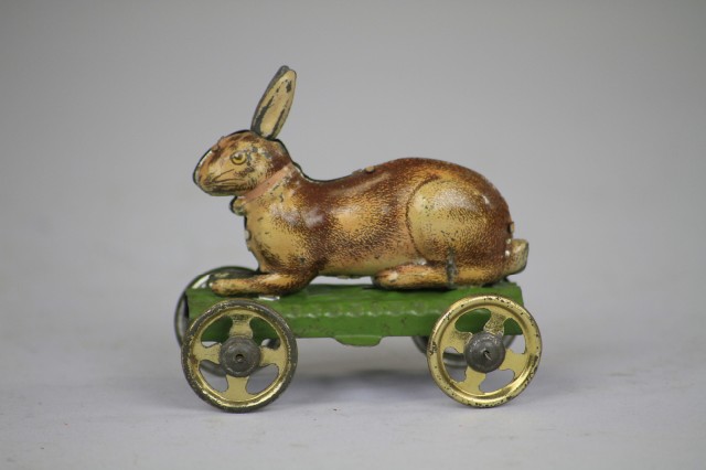 RABBIT ON WHEELS PENNY TOY