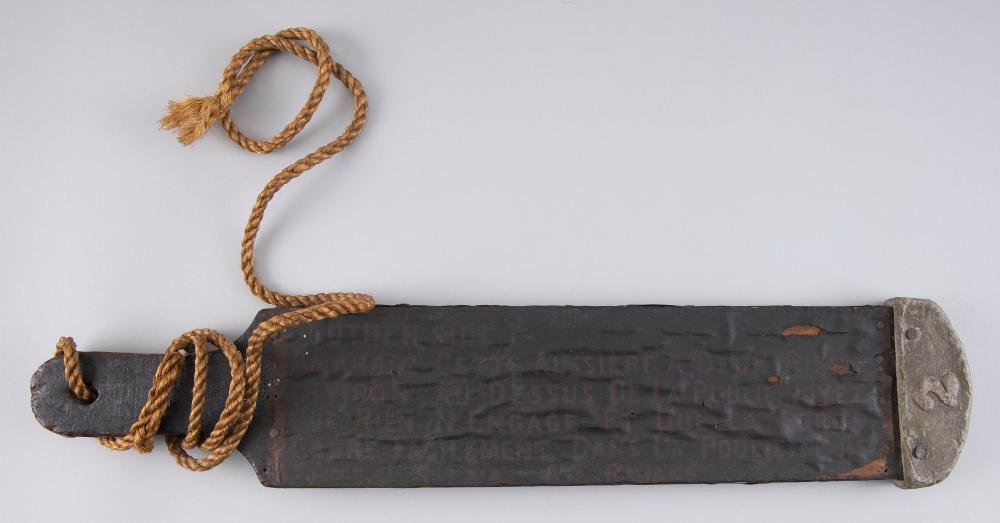 RARE CANVAS-COVERED WOODEN TALLY