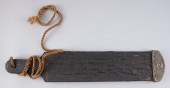RARE CANVAS-COVERED WOODEN TAL