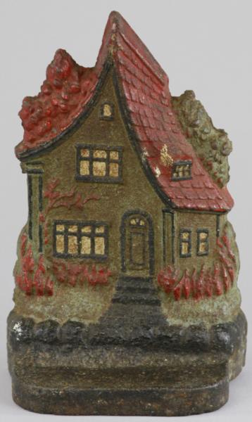 RARE COTTAGE DOORSTOP Depicts a
