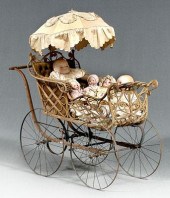 Rattan, wood and steel doll bu