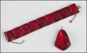 RED AMBEROID AND 9 CARAT YELLO