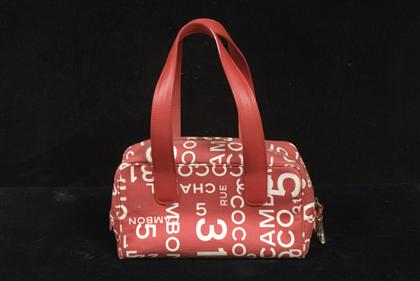 Red and white Chanel travel