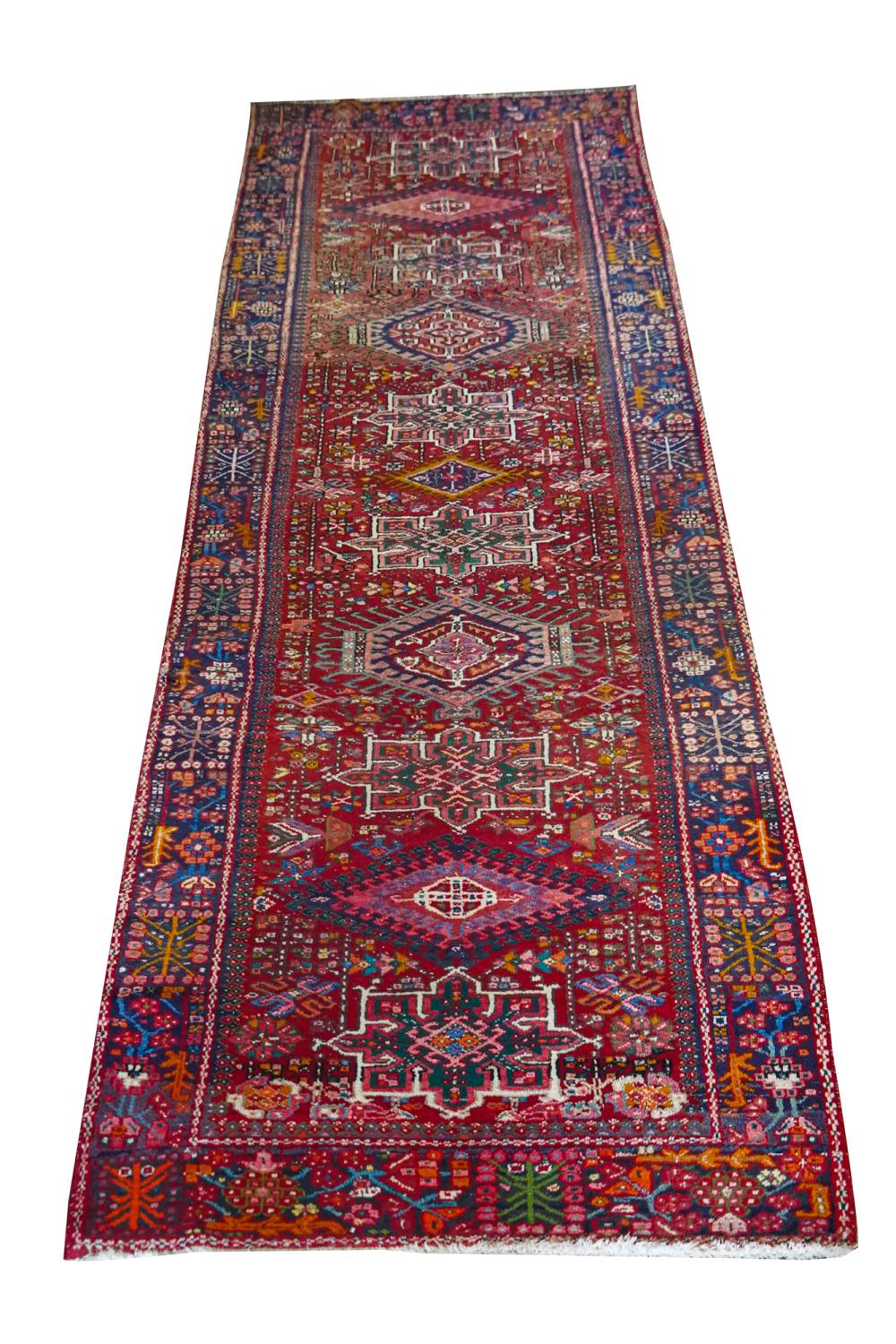 RED FIELD PERSIAN RUNNERwith