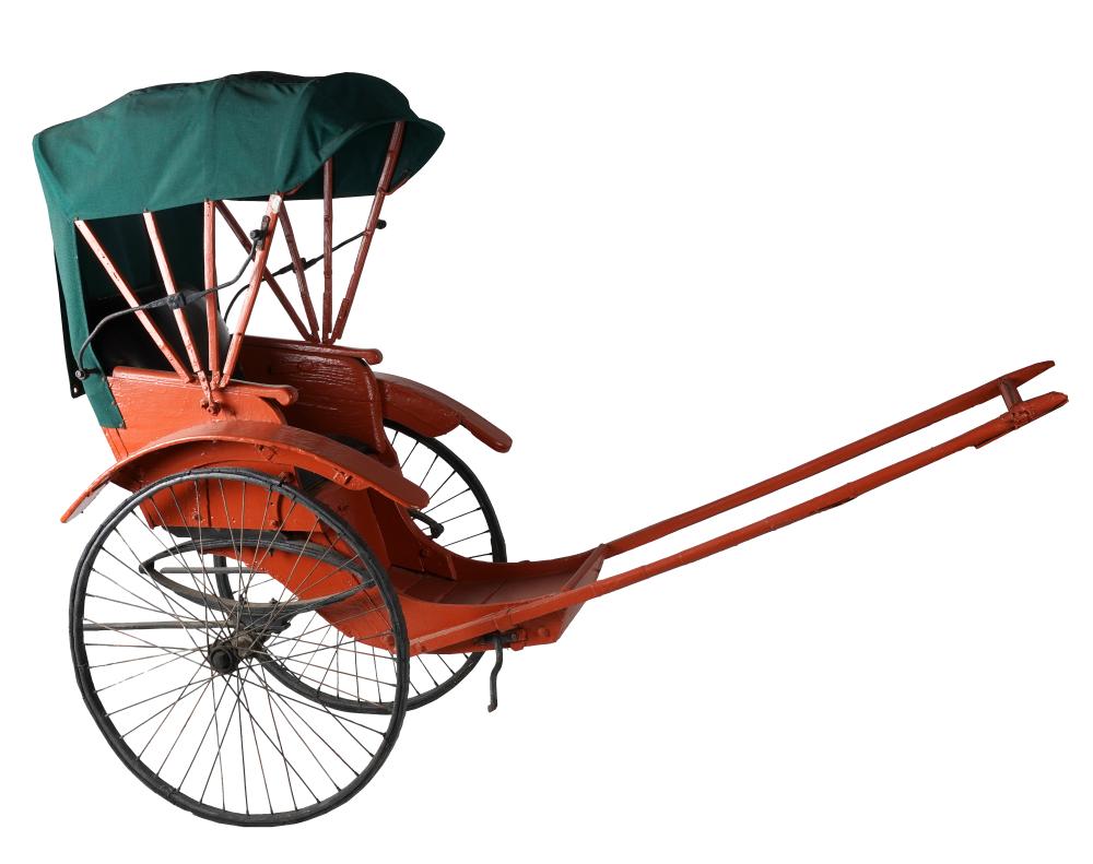 RED-PAINTED RICKSHAWwith newer