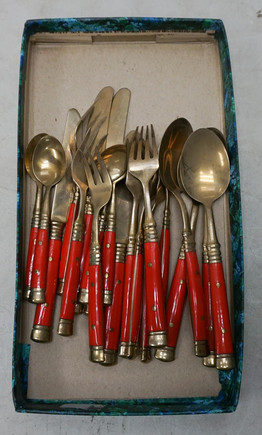 RED PLASTIC AND BRASS TWENTY