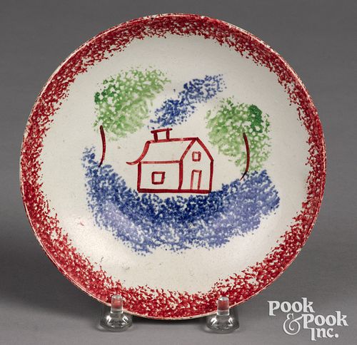 RED SPATTER SAUCER, WITH AN UNUSUAL