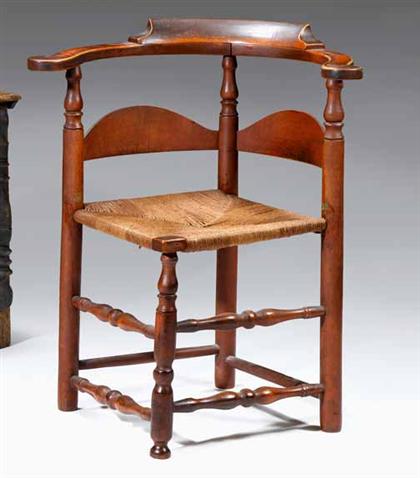 Red-stained and rush-seat corner