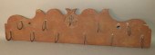 RED STAINED & CARVED SOFTWOOD