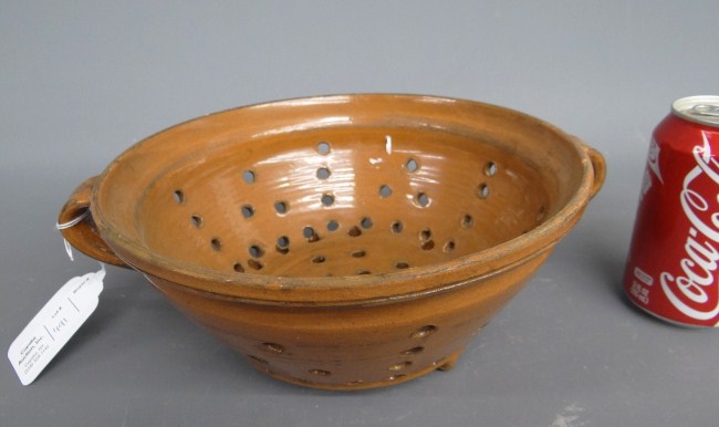 Redware colander. 10'' Diameter.