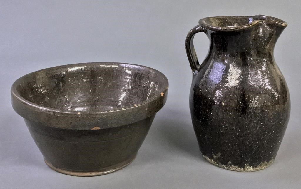 Redware milk pitcher, 8"h and bowl,