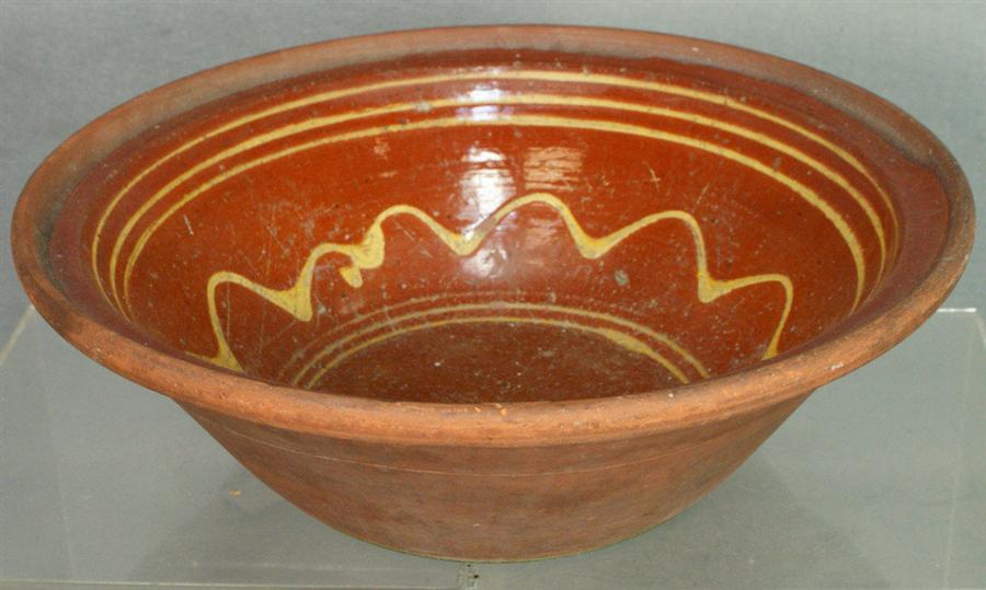 Redware mixing bowl with 3 line and