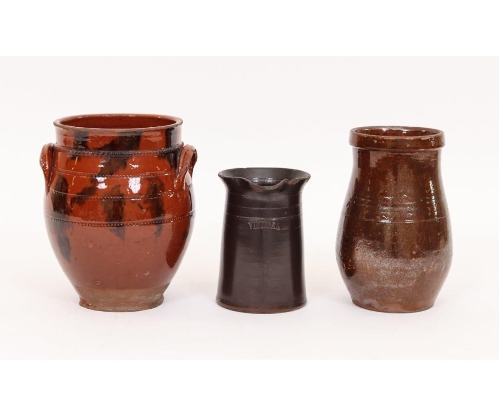 Redware ovoid crock with applied