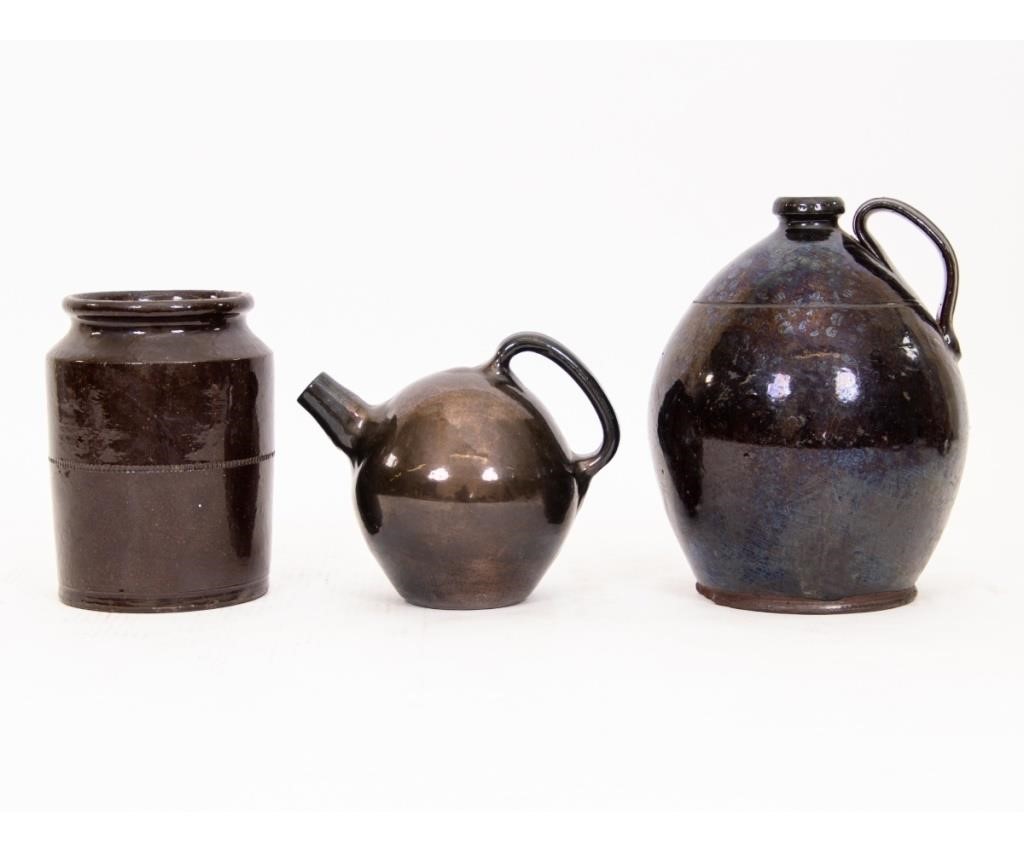 Redware  ovoid jug with black