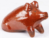 REDWARE SEATED PIG BANK, 19TH