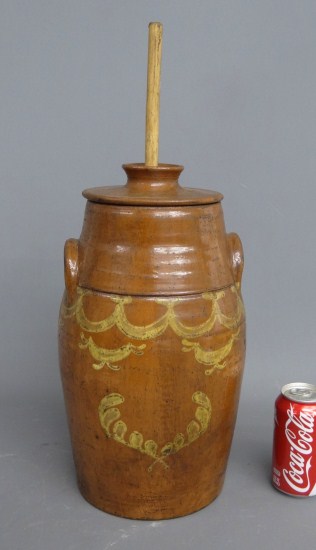 Redware slip decorated butterchurn.