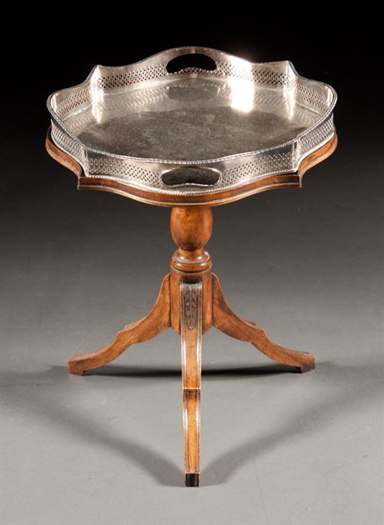 Regency style mahogany shaped-top