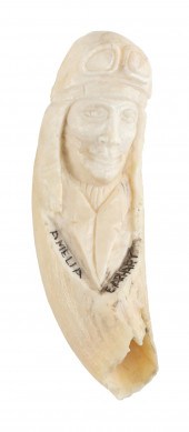 * RELIEF-CARVED WHALE'S TOOTH