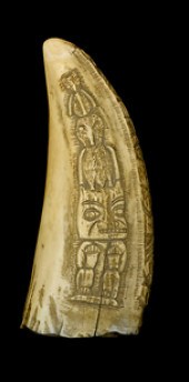 Relief-carved whale's tooth
