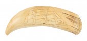 * RELIEF-CARVED WHALE'S TOOTH