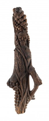 RELIEF-CARVED WOODEN ARCHITECT