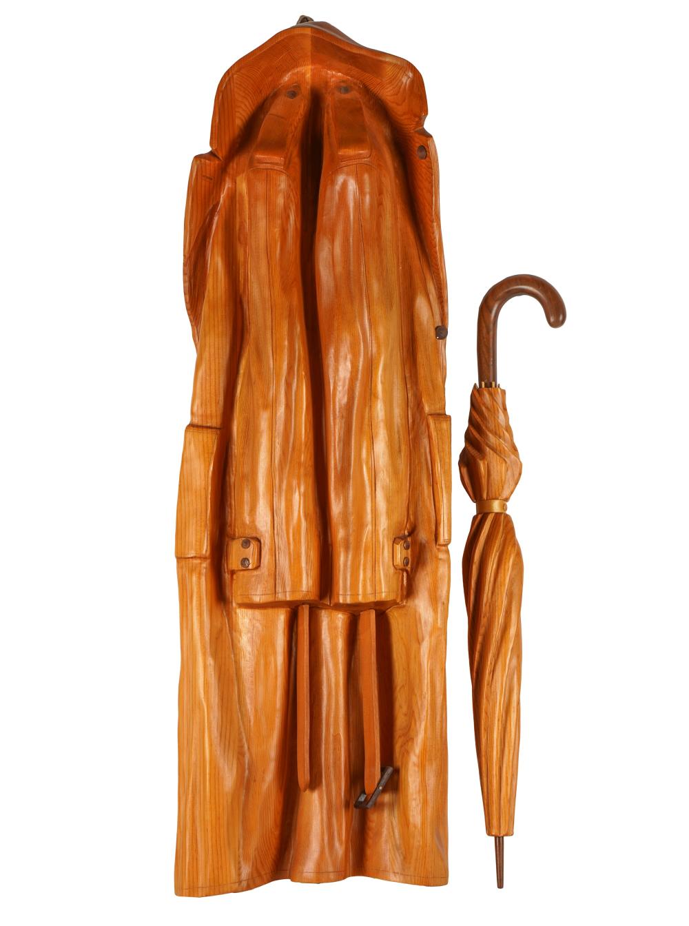 RENE MEGROZ (B. 1942): RAINCOAT &