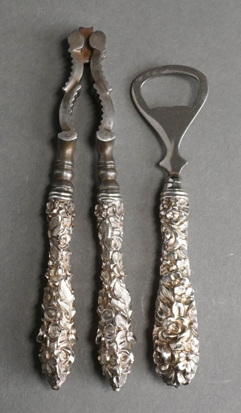 REPOUSSE STERLING SILVER HANDLE