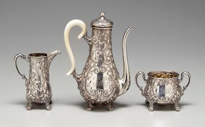 Repousse sterling tea service,