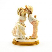 RESIN FIGURAL GROUP, BOY KISSI