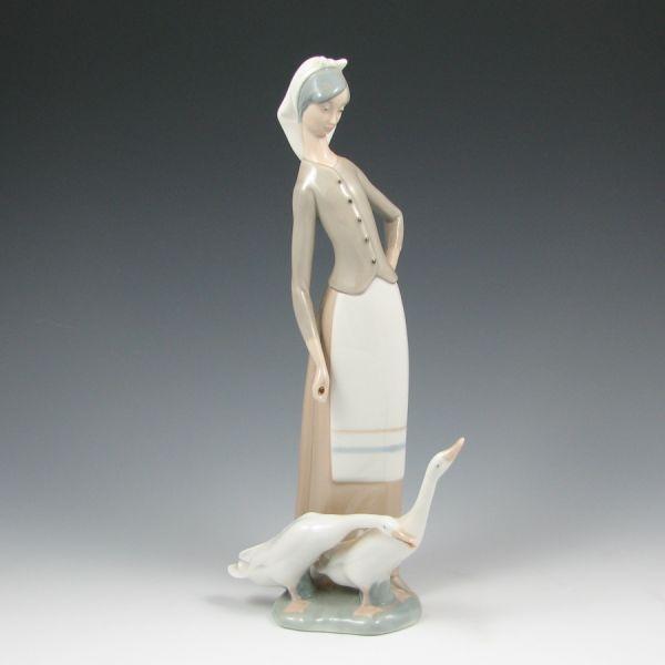 Retired Lladro figurine of a girl