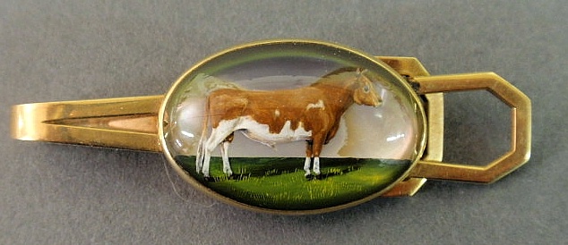 Reverse crystal intaglio and gold