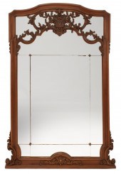 ROCOCO-STYLE CARVED WALNUT OVE