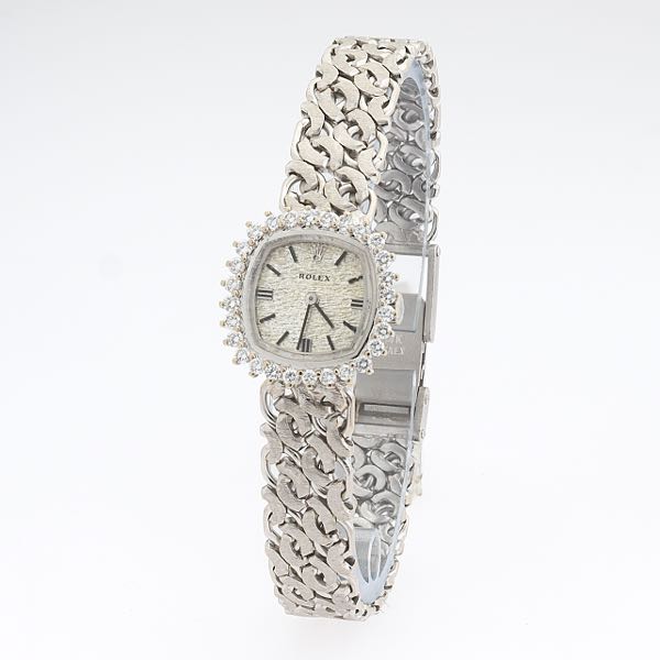 ROLEX MANUAL WIND DIAMOND BEZEL
