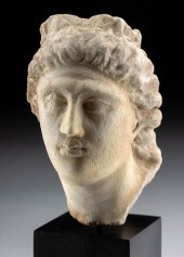 ROMAN MARBLE HEAD OF A GODDESS