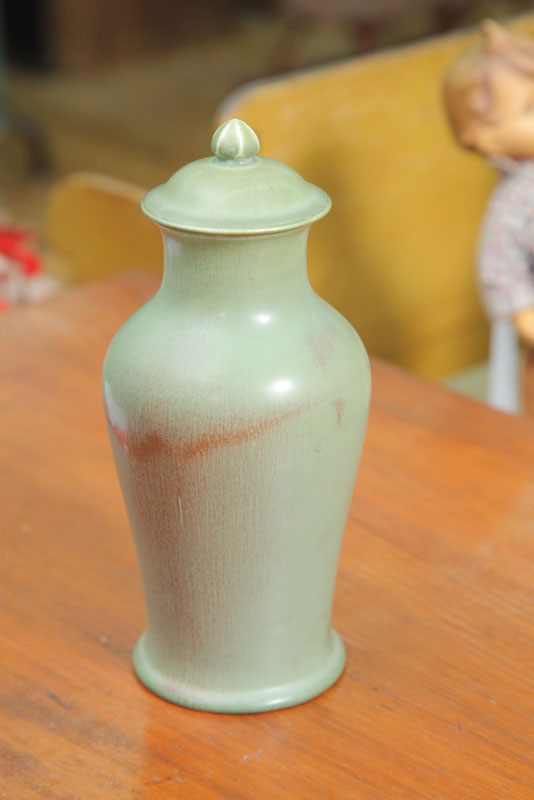 ROOKWOOD URN. Lidded urn in semi