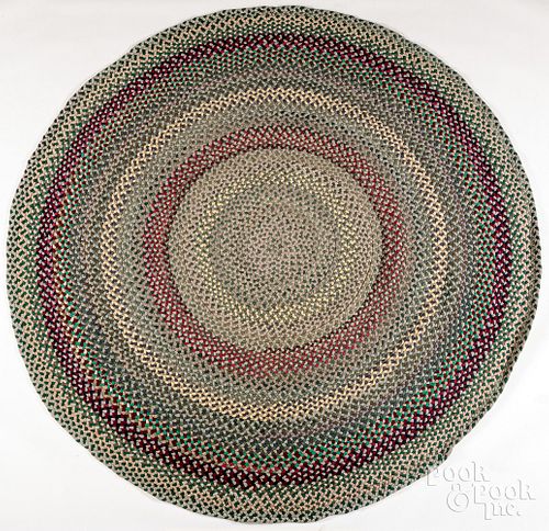 ROOM-SIZED BRAIDED RUGRoom-sized