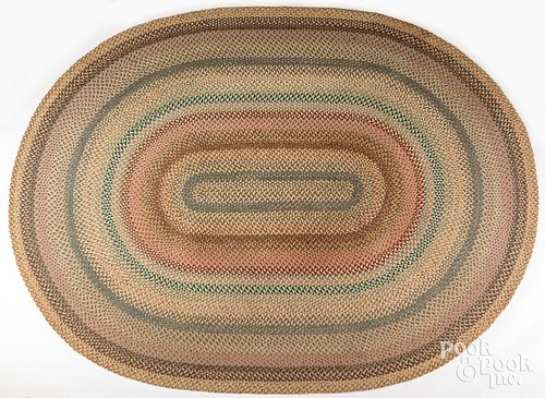 ROOM-SIZED BRAIDED RUGRoom-sized