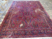ROOMSIZE CARPET, IN RED, WORN