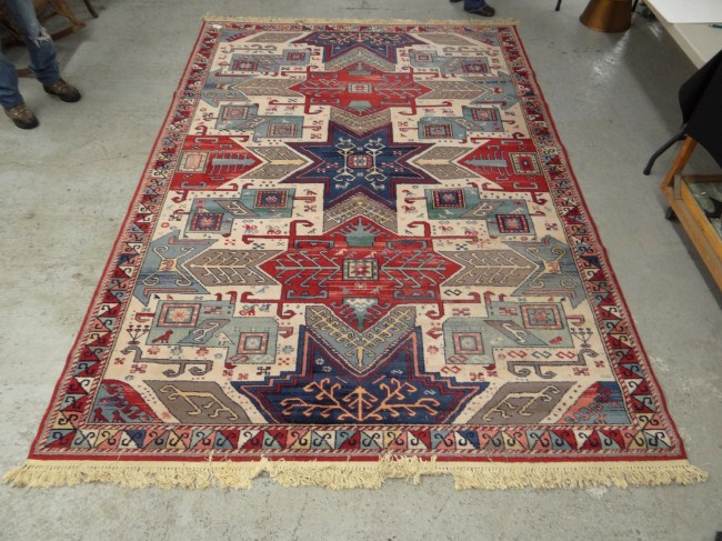 Roomsize rug. 7' 7'' x 11' 4''.