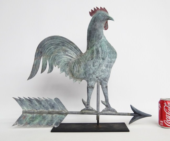 Rooster on arrow weathervane.