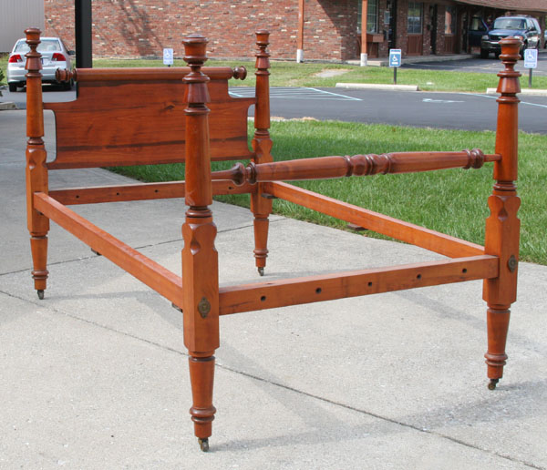 Rope bed with turned posts. 55"H