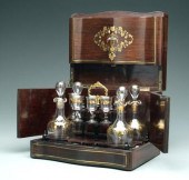Rosewood case, decanters, cord