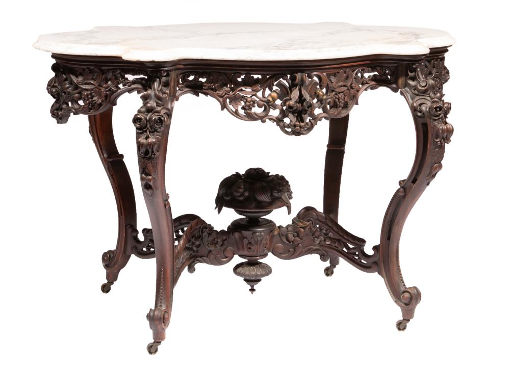 ROSEWOOD CENTER TABLE, ATTR. J. &