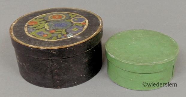 Round blue painted box with tulip