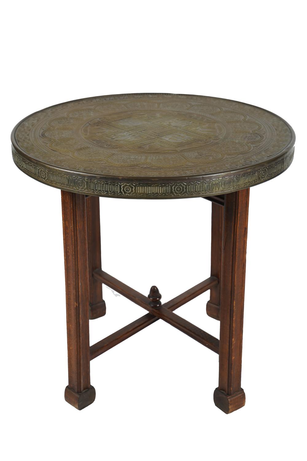 ROUND BRASS TRAY TOP STANDon a