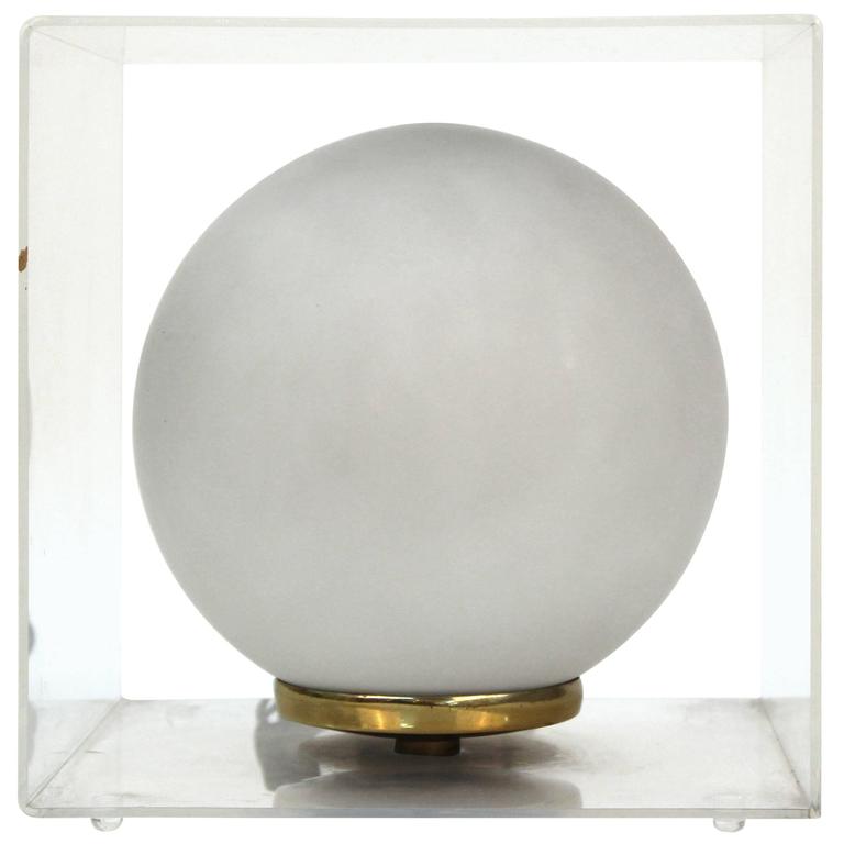 ROUND ENCASED MID-CENTURY MODERN