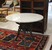 ROUND GRANITE-TOP CAST IRON CA