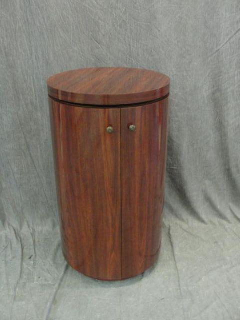 Round Mahogany Bar with Swivel Top.