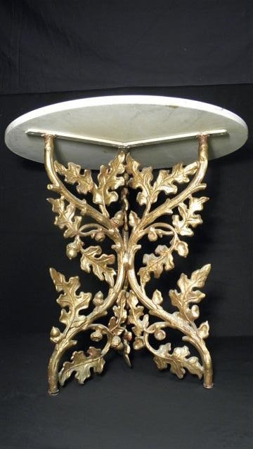 Round marble and iron accent table.