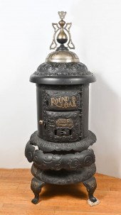 ROUND OAK CAST IRON CYLINDER W